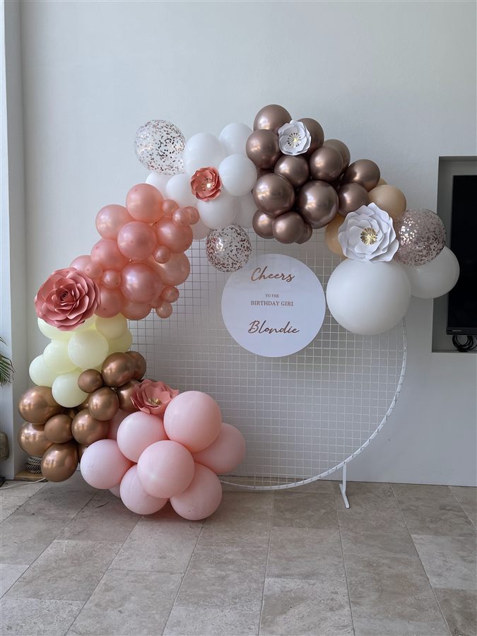 Rose gold, pink and white circular balloon arbour
