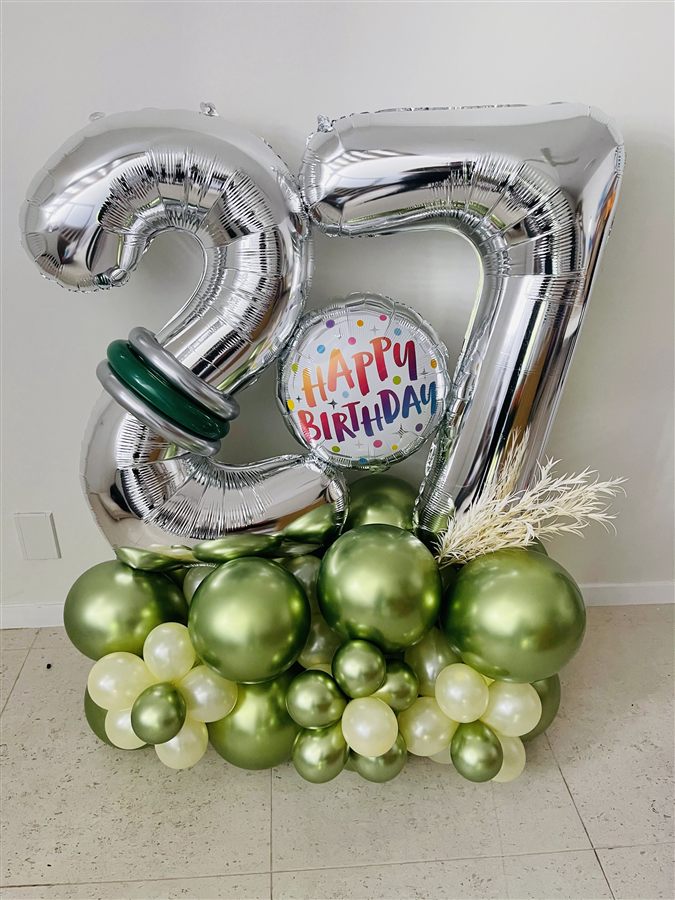 Silver number 27 balloon centrepiece with green balloons