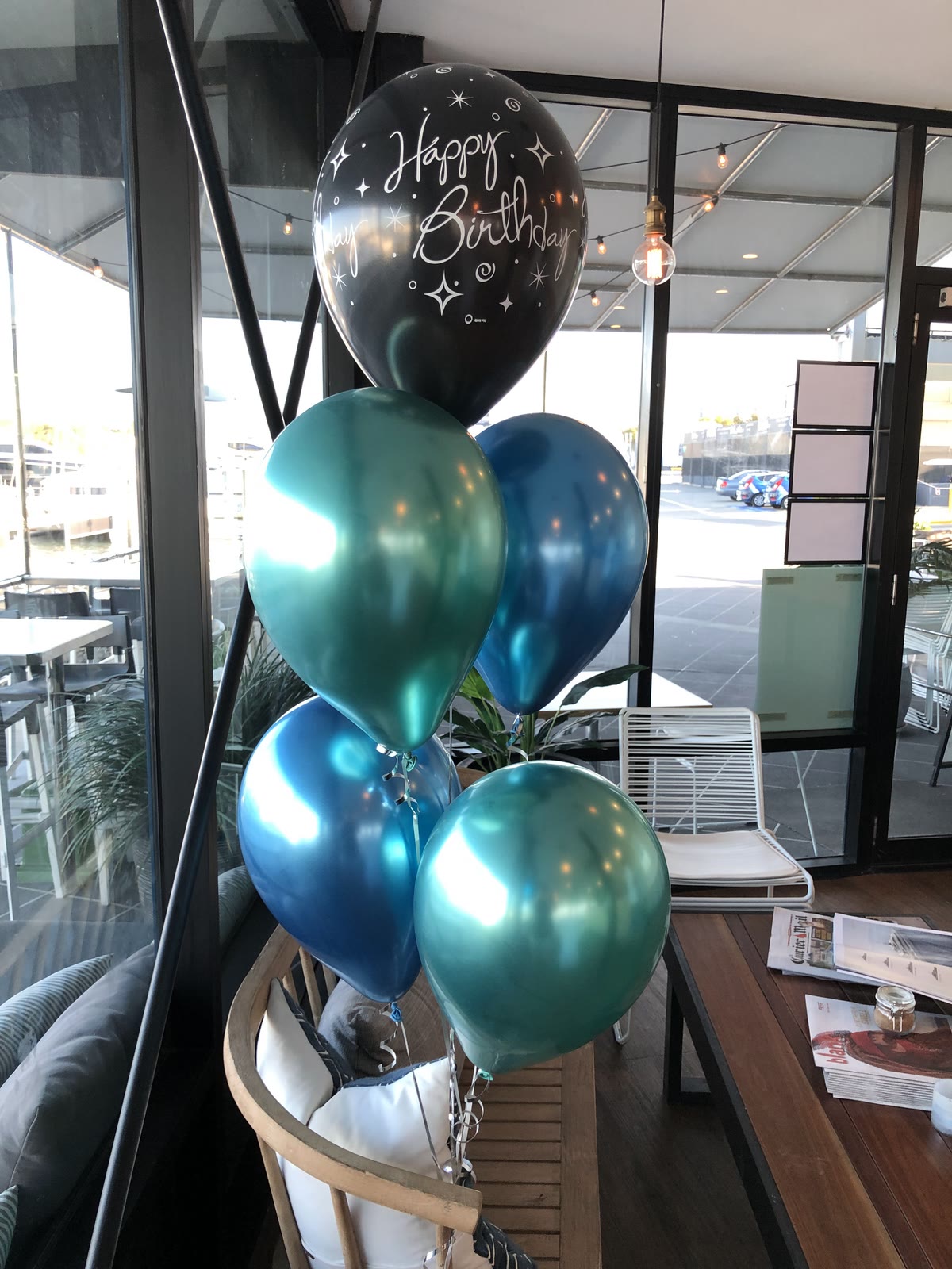 Hand-tied helium balloon bouquet